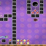 紫色の背景に黒いブロックや星が配置されているシンプルなゲーム画面。