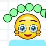 鉛筆で描かれた緑の円の列の下に、笑顔の黄色の顔のイラスト。