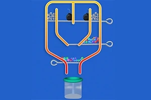 青い背景に、パイプと仕切りを使って色とりどりの玉を容器に導く構造。