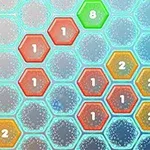 色とりどりの数字が描かれたヘキサゴンが並ぶパズルボード。