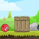 赤い丸いキャラクター、木箱、怒った顔の黒い四角キャラクターが草の上に配置されている風景。