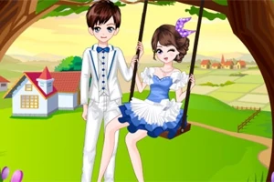 木のブランコに座っている白いスーツの男の子と青いドレスの女の子。