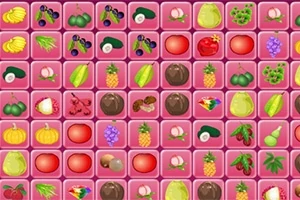様々な果物と野菜が描かれたピンク色のタイルが並んでいる。