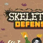 骸骨のデザイン文字で「SKELETON DEFENSE」と書かれたロゴと地面にある爆弾や頭蓋骨。