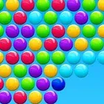 色とりどりのシャボン玉が青い背景に並んでいる画像。