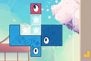 青空と桜を背景に、目のある赤と青のブロックが配置されています。