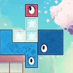 青空と桜を背景に、目のある赤と青のブロックが配置されています。