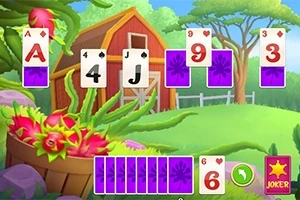緑豊かな牧場を背景に、様々な数字とスートのカードが並んでいます。