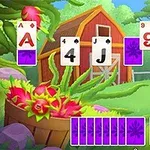 緑豊かな牧場を背景に、様々な数字とスートのカードが並んでいます。