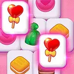 ハート形のキャンディが描かれたブロックがピンクの背景に載っている。