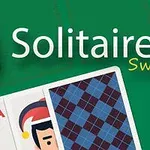 緑色の背景にカードの2とAが部分的に見え、片方にはサンタの帽子をかぶったキャラクターが描かれている。