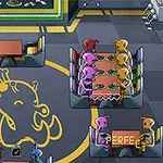 レストランの床に描かれた大きなキャラクターのロゴと、食事をするカラフルなエイリアンたち。