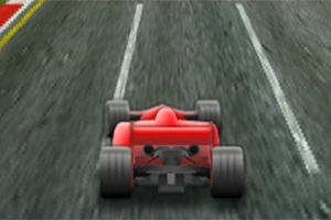 赤いレーシングカーがサーキットを走行している様子。