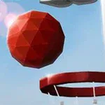 赤い多面体のボールがバスケットボールのリングに向かっているシーン。
