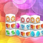カラフルな背景に配置された、さまざまな模様が描かれた白い立方体のブロックの山。