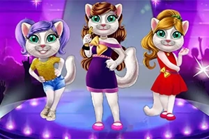 ステージ上で3匹の猫キャラクターがカラフルな衣装を着てポーズを取っている。
