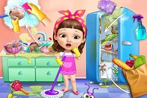 ピンクの服を着た女の子が掃除道具を持って台所の散らかった冷蔵庫の前に立っている。