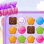 カラフルなキャンディとチョコレートが並んでいるパズルボードのイラスト。