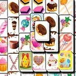 色とりどりのスイーツやお菓子が描かれたタイルが並んでいる。