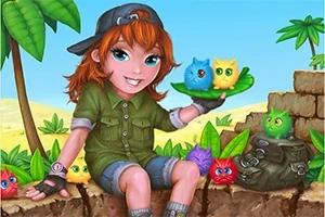緑のシャツを着た少女が、カラフルなふわふわの生き物を手に乗せて座っている。