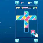 青い背景のパズルゲーム画面で、カラフルなタイルをはめ込むシーン。