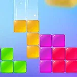 カラフルなブロックが積み重なっている画像で、紫、緑、黄色、赤の四角いブロックが並んでいる。