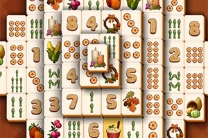 数字や植物、収穫祭をテーマにした絵が描かれたタイルが並んでいる画像。