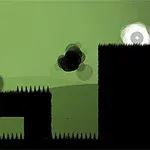 緑色の背景に黒いシルエットのプラットフォームと、目のような模様のある白い円形のキャラクターがいるイメージ。