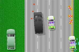 道路の上を黒い車と白と緑のパトカーが走行している。