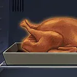 オーブンの中で焼かれている茶色いターキー。
