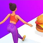 髪をお団子にまとめた女性が、床に置かれたハンバーガーに向かって歩いている。