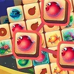 色とりどりの魚や海の生き物が描かれたタイルがグリッド状に並んでおり、赤い魚のタイルが強調されています。