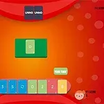 赤い背景に、中央に緑のカードがあり、下部には青、緑、黄色などの数字カードが並んでいる。