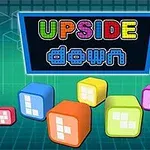 カラフルなキューブが並ぶ背景に、「UPSIDE down」という文字が表示されたデジタル風のデザイン。