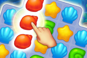 指で赤い貝殻を3つ揃えるパズル画面。
