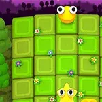 緑のグリッド上に黄色いキャラクターが配置され、周囲に小さな花が咲いている景色。