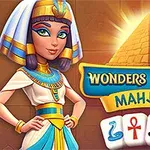 エジプト風の衣装を着た女性とピラミッド、マークや文字が描かれたタイル。