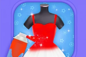 トルソーに着せた赤いドレスにスプレーペイントを施している様子。