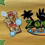 ゾンビのイラストと「Zombies at the Beach」のロゴがヤシの木のシルエットを背景に描かれている画像。