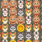 カラフルな動物の顔と蝶がグリッド状に並び、コインが点在しています。