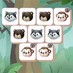 森の背景に動物の顔が描かれたタイルが並ぶイラスト。