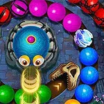 カラフルなボールが螺旋状に並び、中央の青いキャラクターが光の球を発射しています。